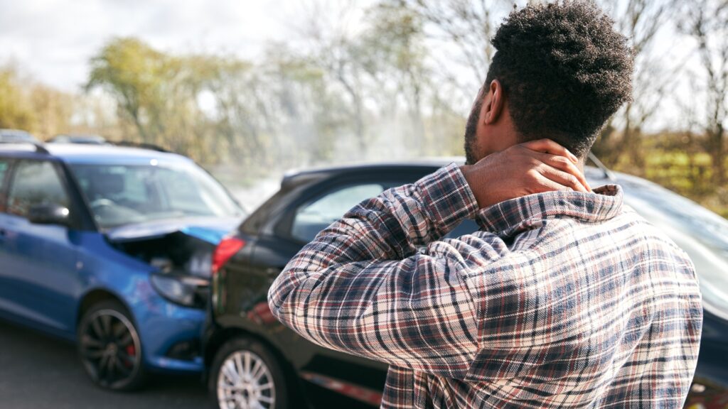 Rear end accident with man holding neck