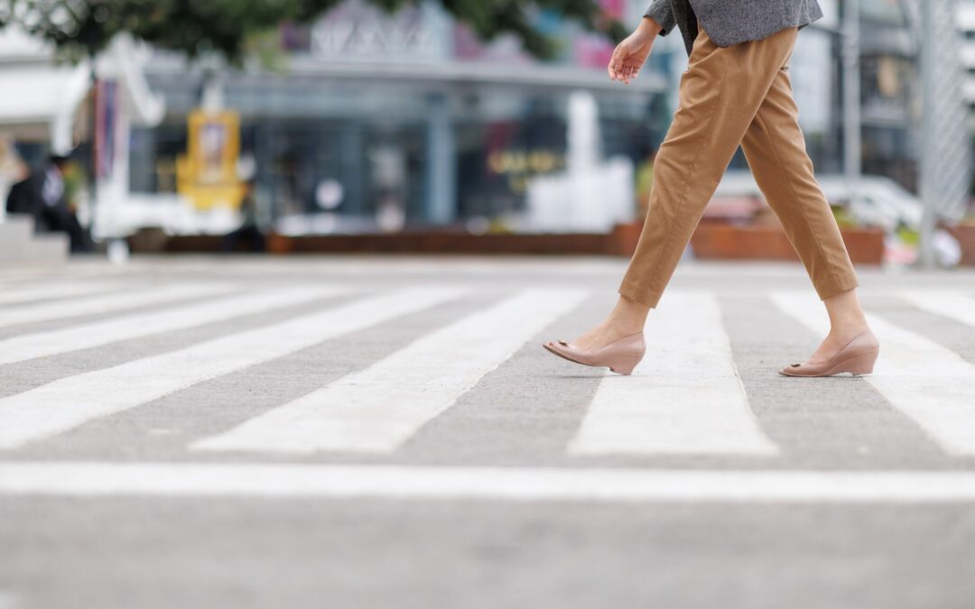 Pedestrian walking across road